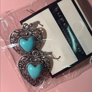 silver heart earrings with blue stone in middle!